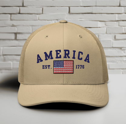 America Est. 1776 Trucker Hat – Blue Embroidery, Patriotic Cap for Proud Americans, Perfect Gift for Freedom Lovers