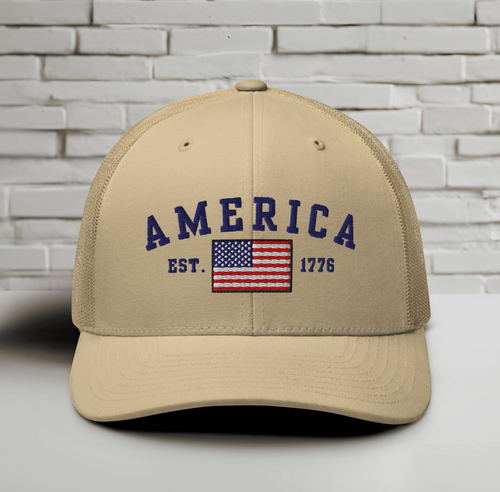 America Est. 1776 Trucker Hat – Blue Embroidery, Patriotic Cap for Proud Americans, Perfect Gift for Freedom Lovers