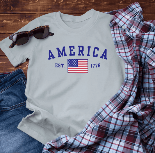 America Est 1776 Patriotic Unisex T-Shirt (Blue Print) Celebrate Freedom and Liberty, Independence Day Shirt - SKULLFURY MERCH