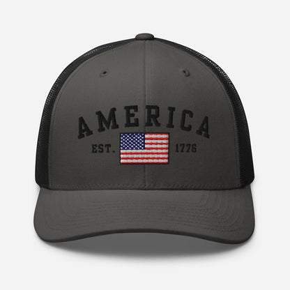 America Est. 1776 Trucker Hat – Black Embroidery, Patriotic Cap for Proud Americans, Perfect Gift for Freedom Lovers - SKULLFURY MERCH
