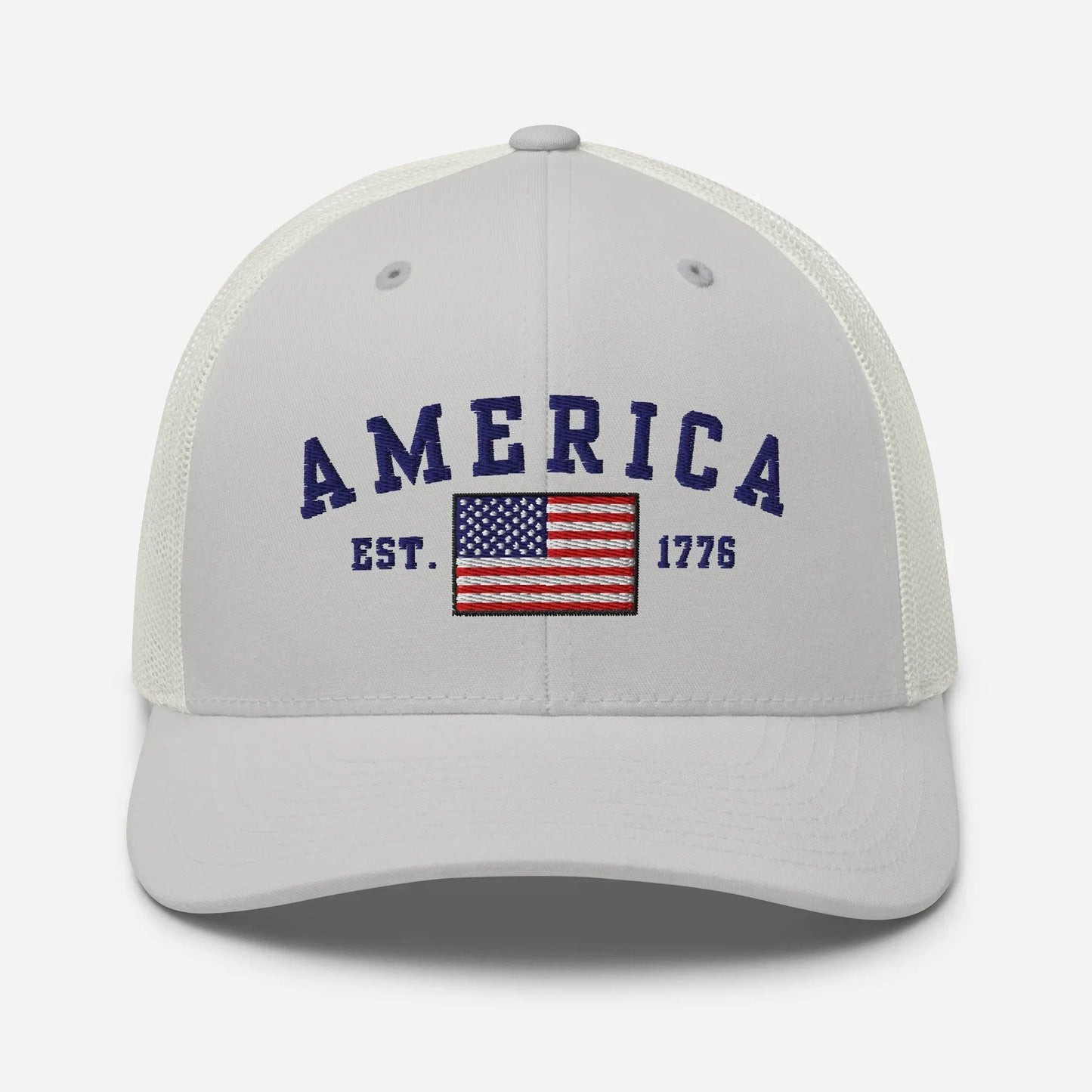 America Est. 1776 Trucker Hat – Blue Embroidery, Patriotic Cap for Proud Americans, Perfect Gift for Freedom Lovers - SKULLFURY MERCH