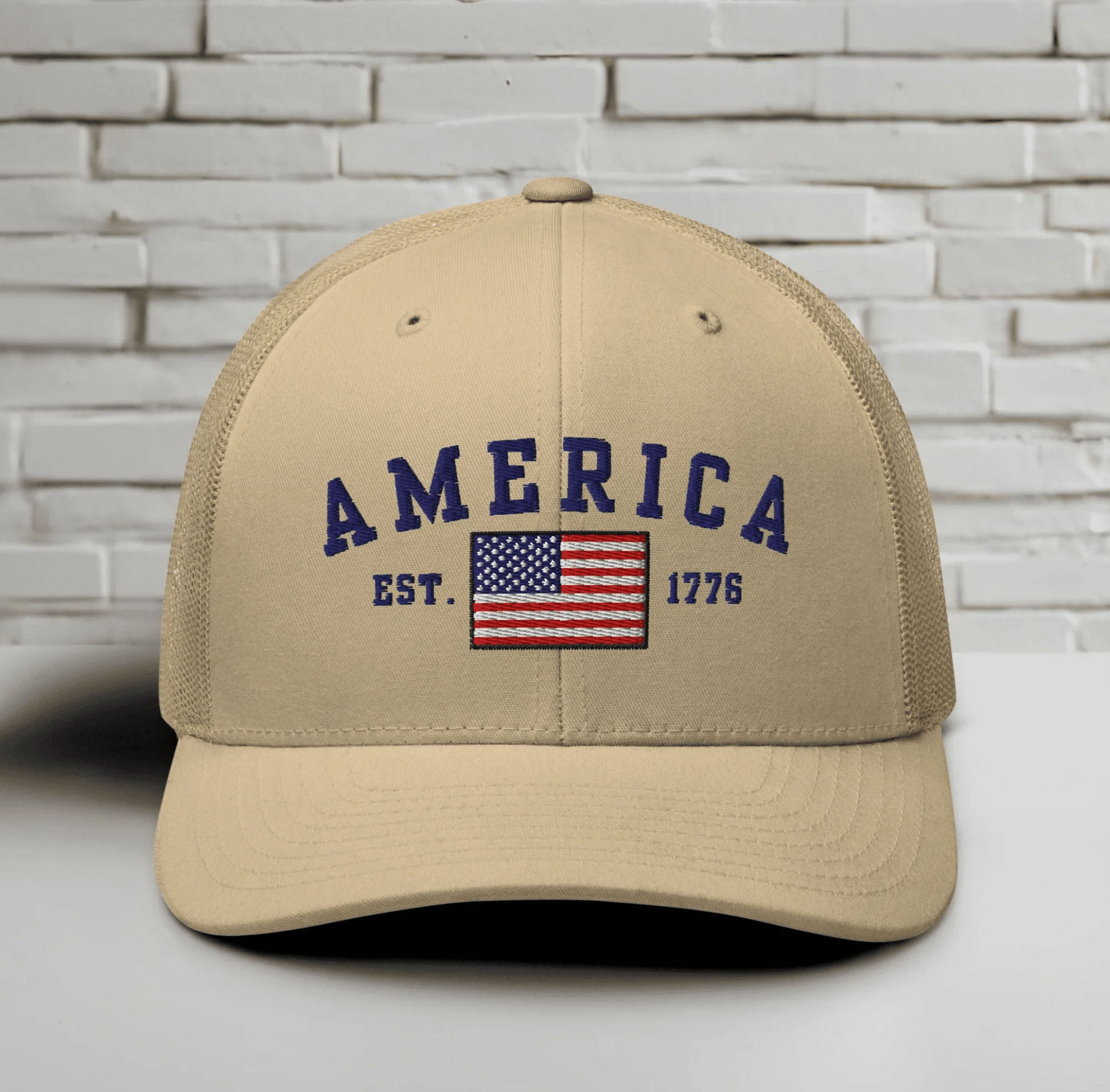 America Est. 1776 Trucker Hat – Blue Embroidery, Patriotic Cap for Proud Americans, Perfect Gift for Freedom Lovers - SKULLFURY MERCH