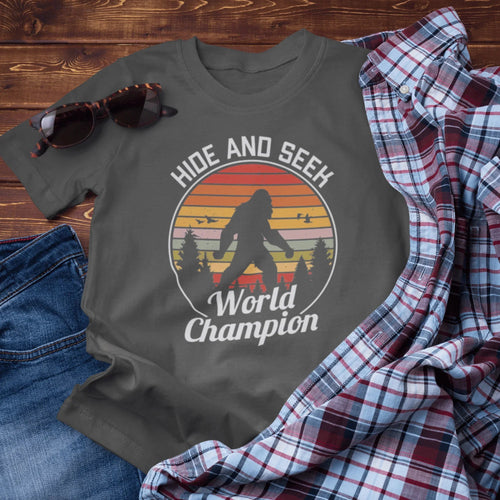 Bigfoot Hide and Seek Champion Tee, Unisex T-Shirt, Fun Gift for Kids & Adults, Retro Humor Shirt, Nature Lover Apparel, Perfect for Parties - SKULLFURY MERCH