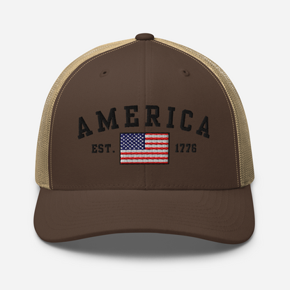 America Est. 1776 Trucker Hat – Black Embroidery, Patriotic Cap for Proud Americans, Perfect Gift for Freedom Lovers