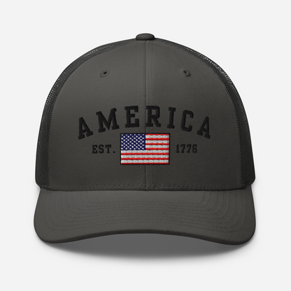 America Est. 1776 Trucker Hat – Black Embroidery, Patriotic Cap for Proud Americans, Perfect Gift for Freedom Lovers