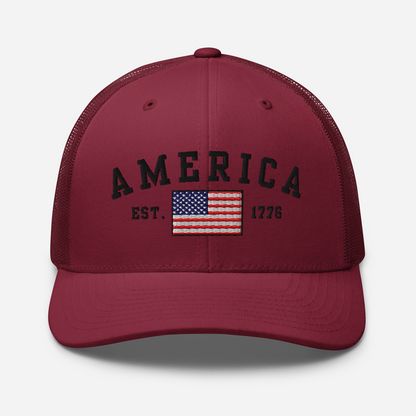 America Est. 1776 Trucker Hat – Black Embroidery, Patriotic Cap for Proud Americans, Perfect Gift for Freedom Lovers