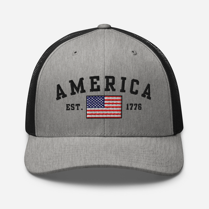 America Est. 1776 Trucker Hat – Black Embroidery, Patriotic Cap for Proud Americans, Perfect Gift for Freedom Lovers