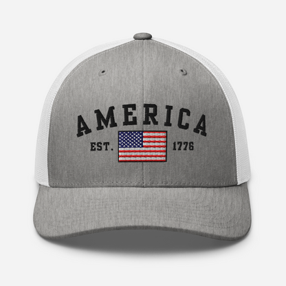 America Est. 1776 Trucker Hat – Black Embroidery, Patriotic Cap for Proud Americans, Perfect Gift for Freedom Lovers